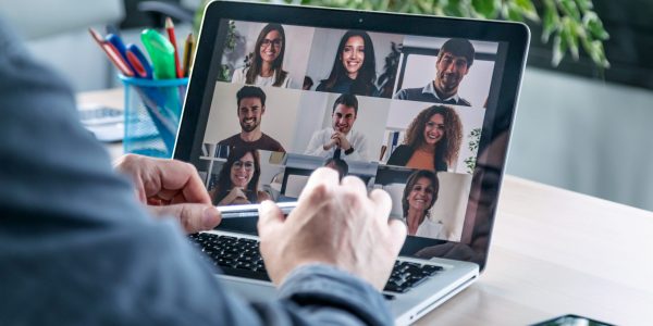 Man on a video call with colleagues