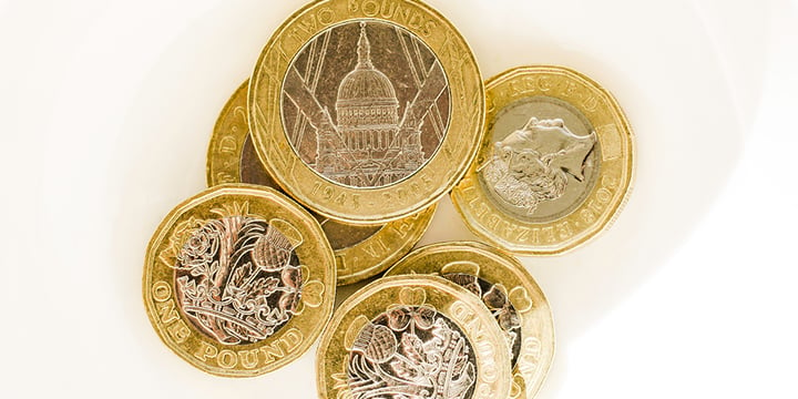 A-stack-of-gold-coloured-British-pound-coins