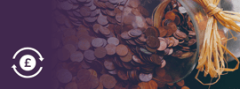 A laid jar with coins spilling out