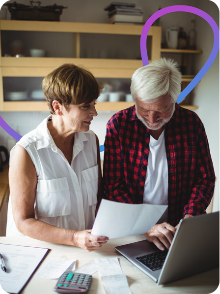 Man and woman paying bills online