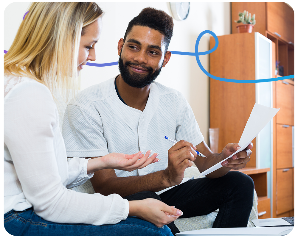 Man and woman working on paper application