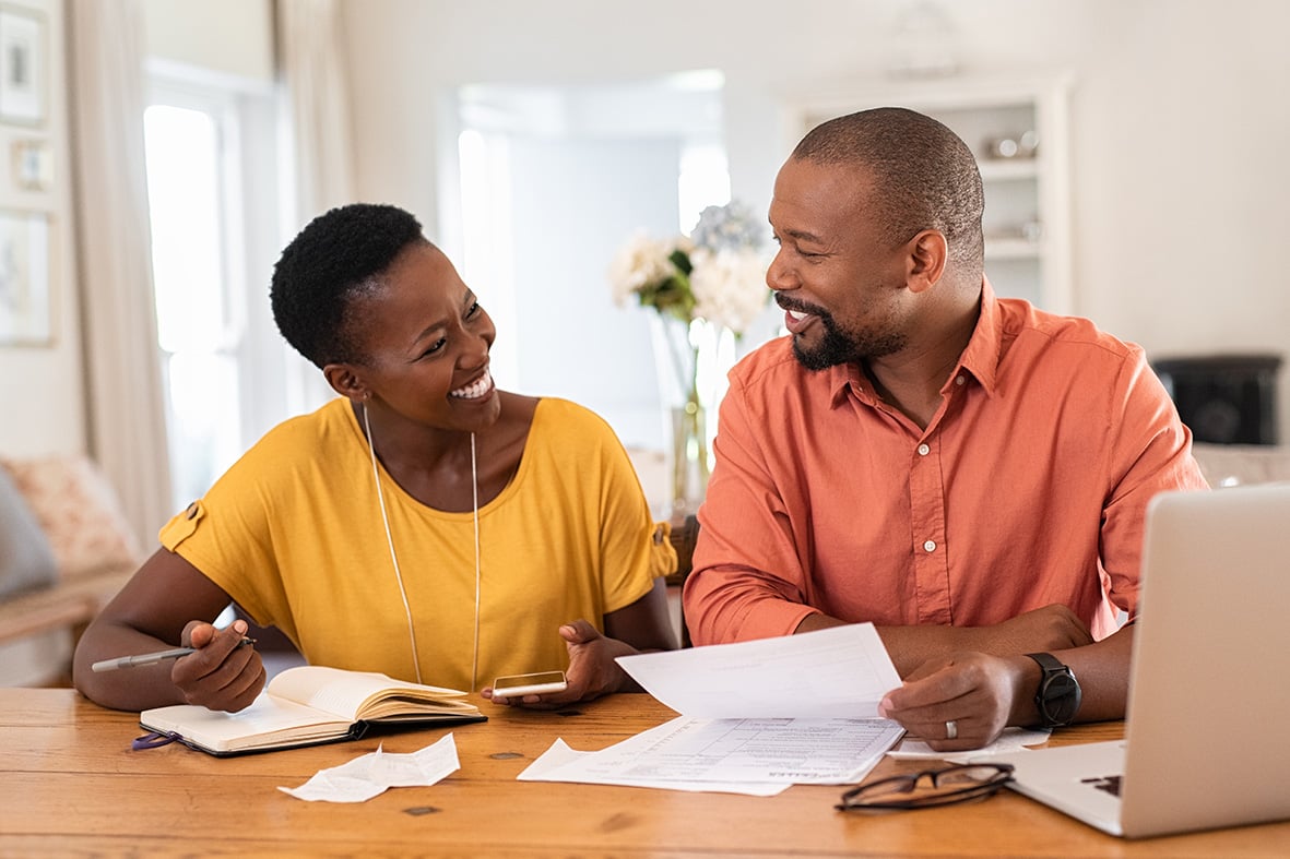 Man and woman planning at a table