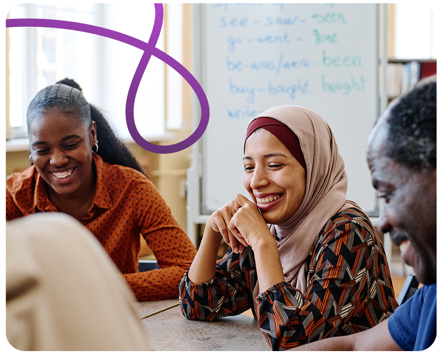 three people in community centre receiving training